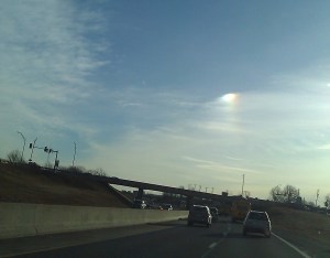 The rainbow 'sundog' is the bright spot in the sky.